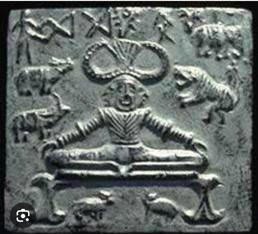 Seated figure / seal reference